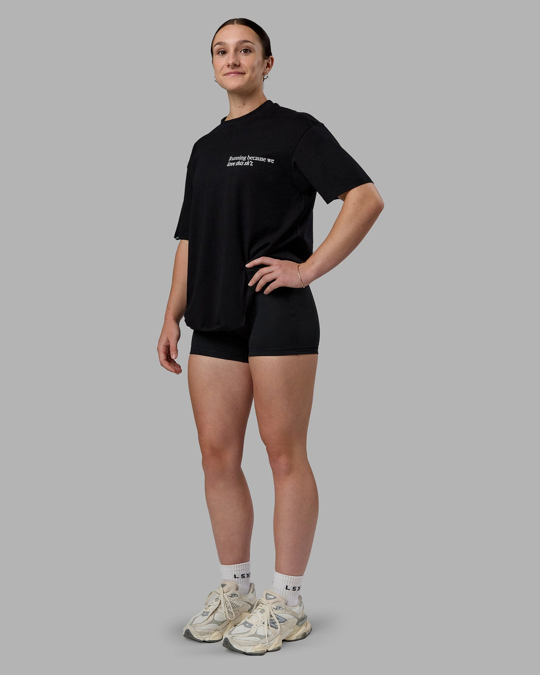 Woman wearing Checklist FLXCotton Tee Oversize - Black | Model:Sav | Size:XS