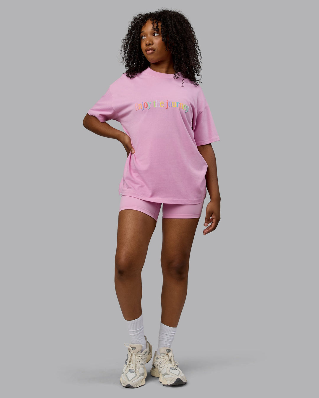 Woman wearing Unisex Enjoy The Journey Heavyweight Tee Oversize - Bubblegum-Multi