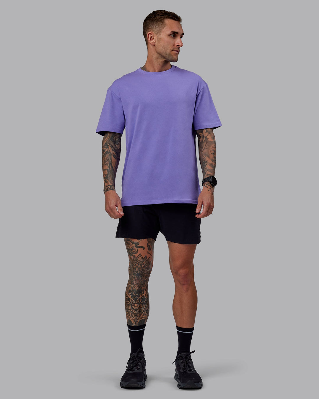 Man wearing Unisex Keep On Running FLXCotton Tee Oversize - Dahlia Purple