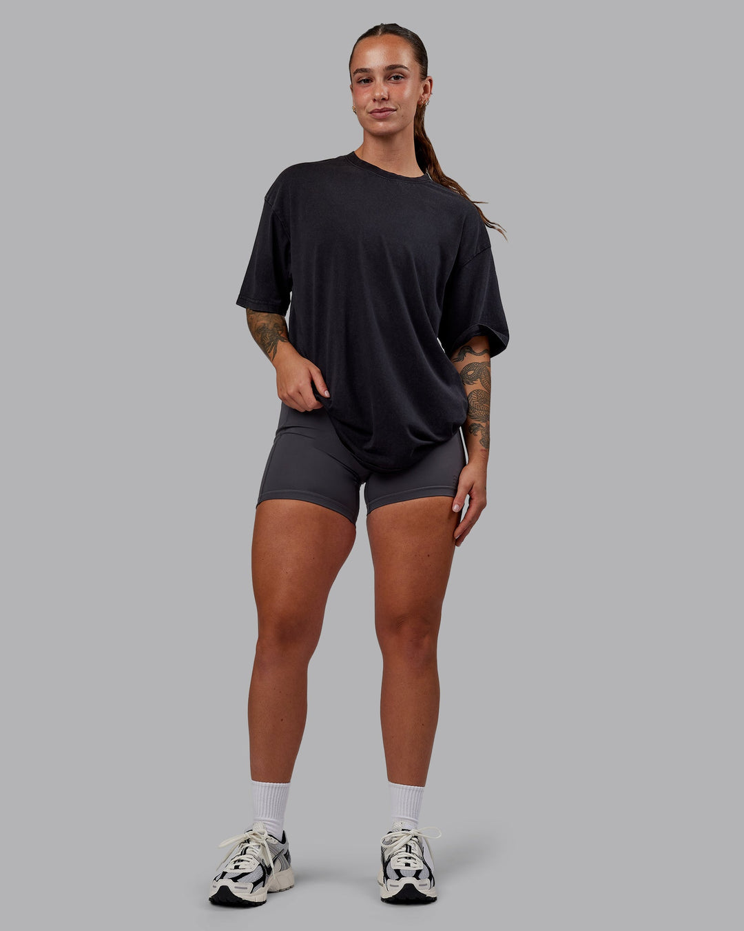 Woman wearing Set The Standard Washed FLXCotton Oversized Tee in Black-Black | Size:S