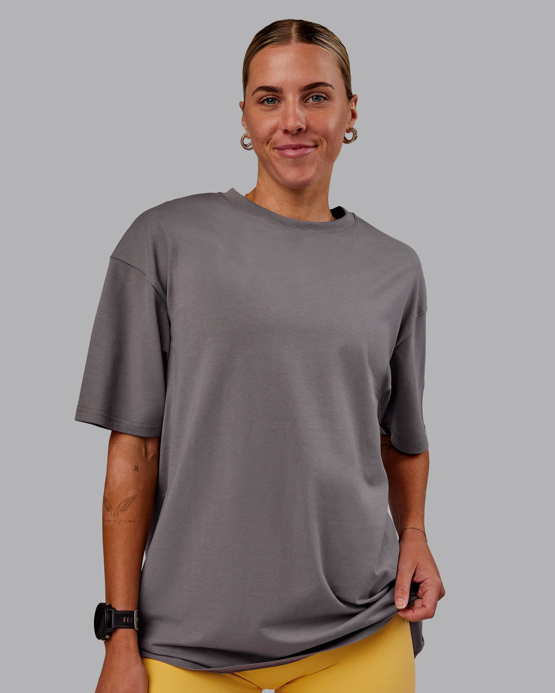 Woman wearing Variation FLXCotton Oversized Tee in Storm Front-Pale Banana | Size:S