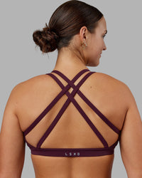 Woman wearing Velocity Sports Bra - Cherry Lacquer | Model:Keisha | Size:S | Thumbnail Index: 5