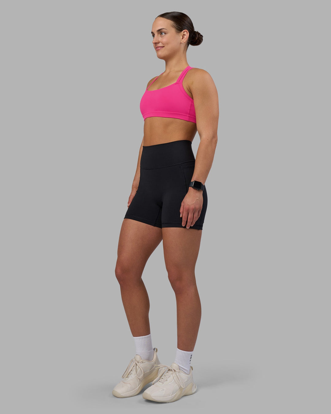 Woman wearing Velocity Sports Bra - Ultra Pink | Model:Keisha | Size:S