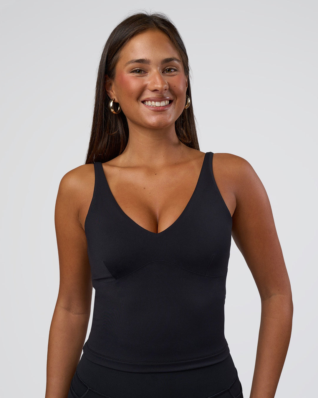 Woman wearing Vitality Active Tank - Black | Model:Bianca | Size:S - view 1