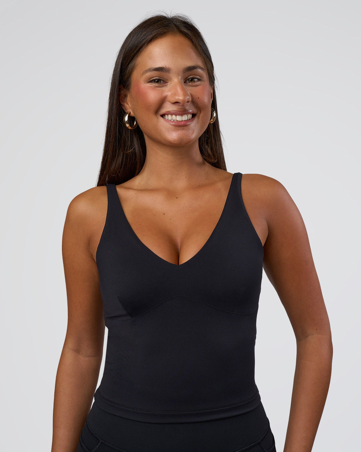 Woman wearing Vitality Active Tank - Black | Model:Bianca | Size:S