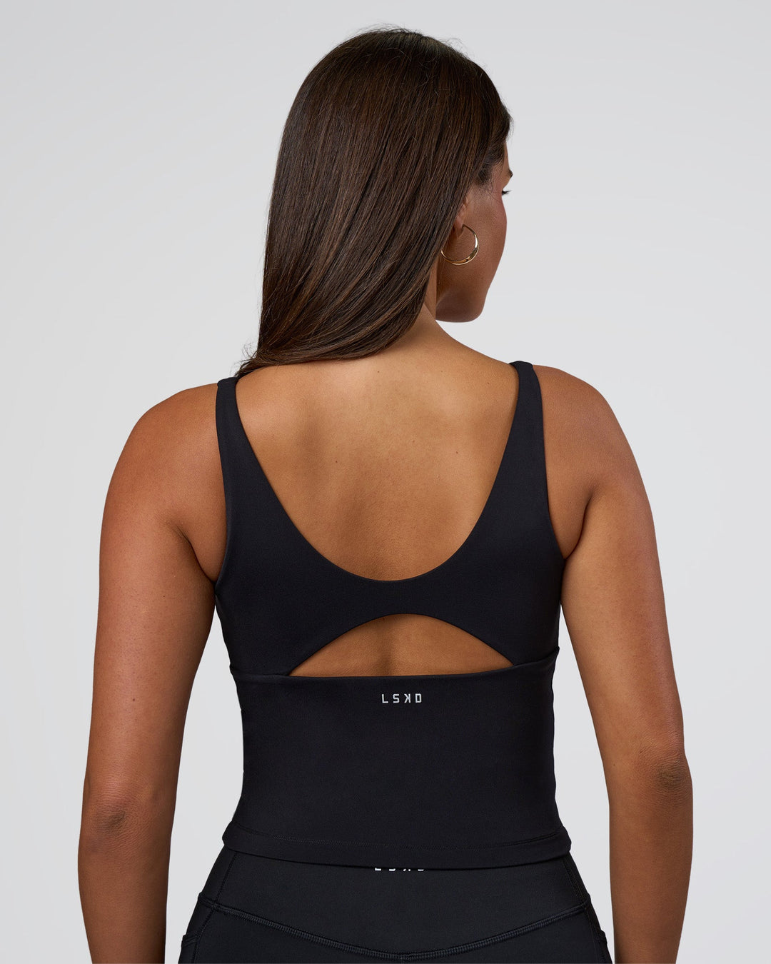 Woman wearing Vitality Active Tank - Black | Model:Bianca | Size:S - view 2