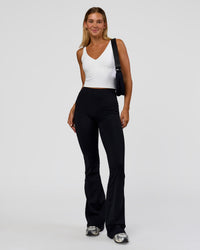 Woman wearing Vitality Active Tank - White | Model:Amity | Size:S | Thumbnail Index: 1