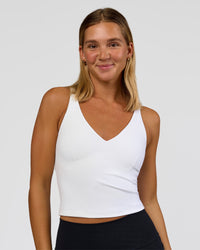 Woman wearing Vitality Active Tank - White | Model:Amity | Size:S | Thumbnail Index: 0