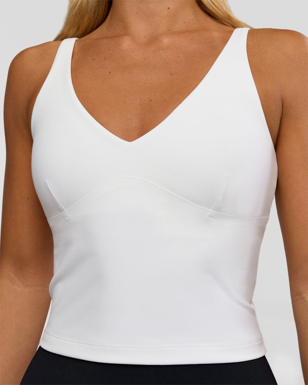 Woman wearing Vitality Active Tank - White | Model:Amity | Size:S - view 4