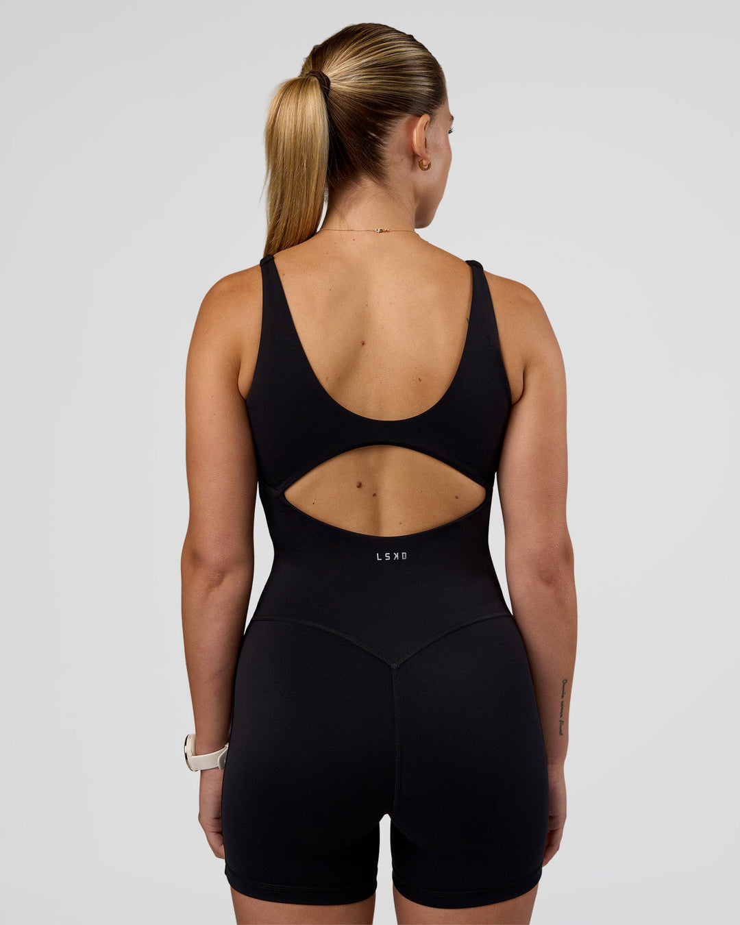 Woman wearing Vitality Bodysuit - Black | Model:Myrte | Size:S - view 8