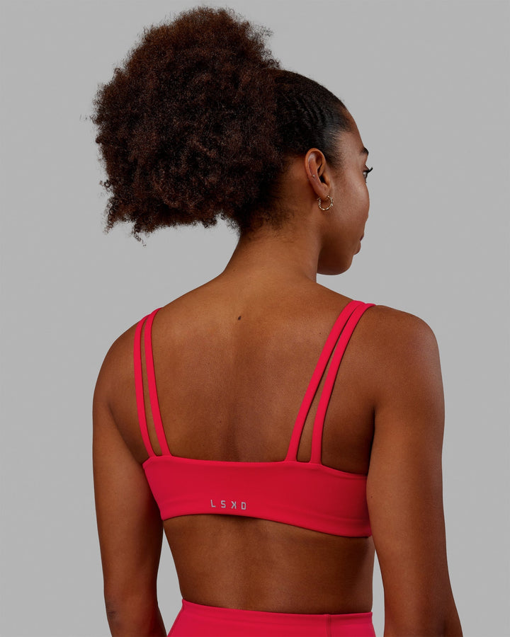 Woman wearing Vogue Sports Bra - Scarlet
