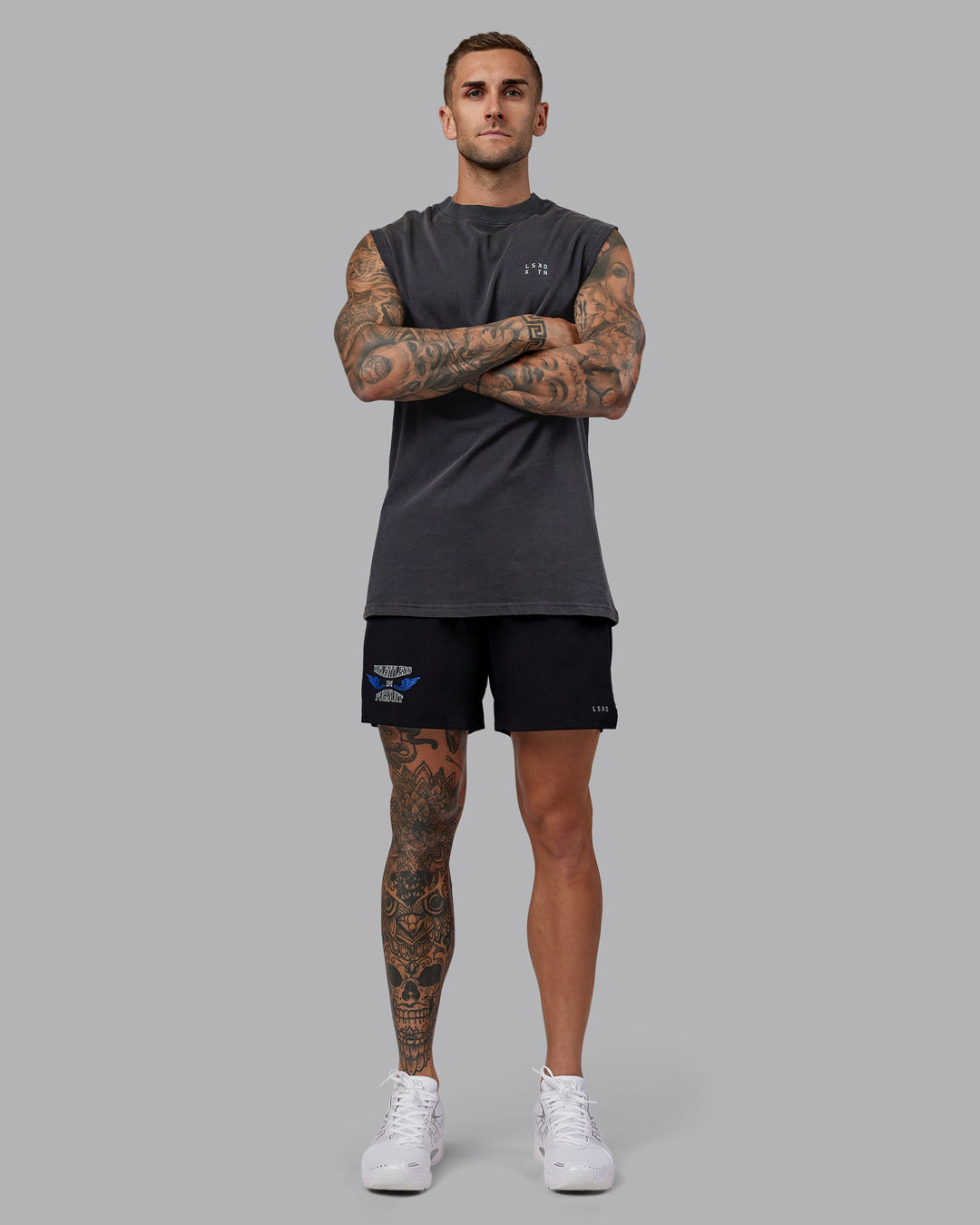 Man wearing Washed Relentless Heavyweight Oversized Tank - Black-Grey | Model:Tommy | Size:S