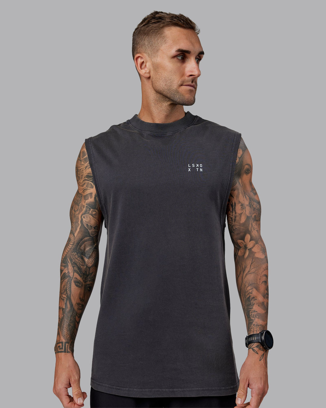 Man wearing Washed Relentless Heavyweight Oversized Tank - Black-Grey | Model:Tommy | Size:S