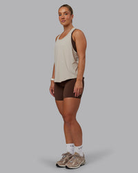 Woman wearing AeroFLX+ Drop Armhole Seamless Tank - Shale Beige | Model:Lyss | Size:S | Thumbnail Index: 3