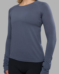 Woman wearing AeroFLX+ Seamless Long Sleeve Tee - Night Shadow/Night Shadow | Model:Halle | Size:S | Thumbnail Index: 3