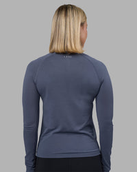 Woman wearing AeroFLX+ Seamless Long Sleeve Tee - Night Shadow/Night Shadow | Model:Halle | Size:S | Thumbnail Index: 2