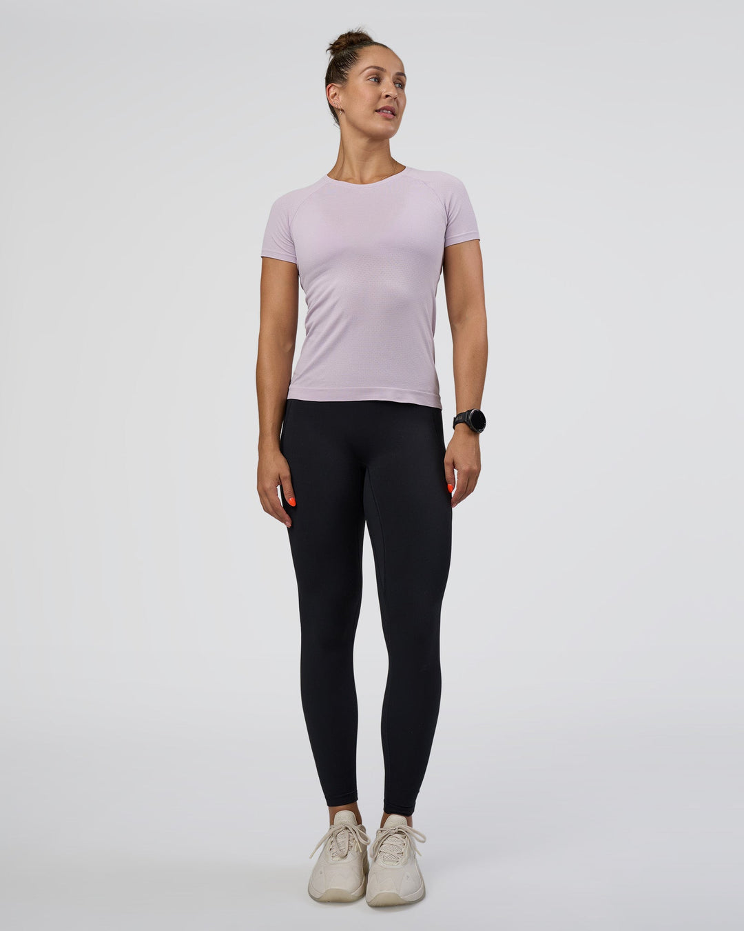 Woman wearing AeroFLX+ Seamless Tee - Fair Orchid/Fair Orchid | Model:Abbey | Size:S