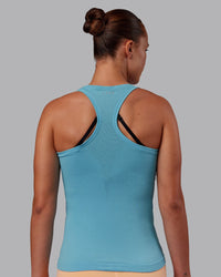 Woman wearing AeroFLX+ Seamless Tank - Retro Blue/Retro Blue | Model:Charlize | Size:S | Thumbnail Index: 5