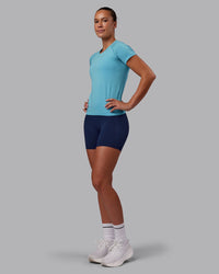 Woman wearing AeroFLX+ Seamless Tee - Retro Blue Marl | Model:Charlize | Size:S | Thumbnail Index: 5