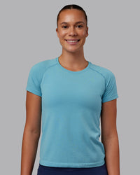 Woman wearing AeroFLX+ Seamless Tee - Retro Blue Marl | Model:Charlize | Size:S | Thumbnail Index: 4
