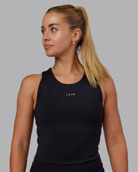 Woman wearing Base Tank - Black | Size:S | Model:Hannah