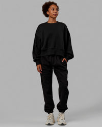 Woman wearing MVP Oversized Sweater - Black | Thumbnail Index: 2