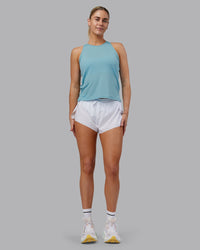 Woman wearing Pace Running Tank - Retro Blue | Model:Hannah | Size:S | Thumbnail Index: 4