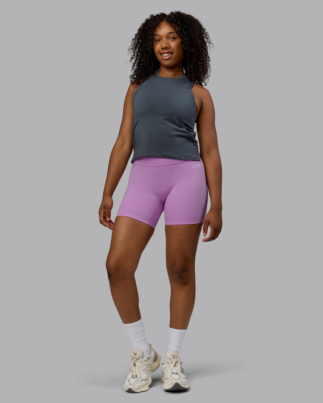 Woman wearing Deluxe PimaFLX Tank - Turbulence