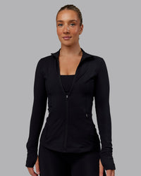 Woman wearing Stride Zip Through Jacket in Black | Size:S