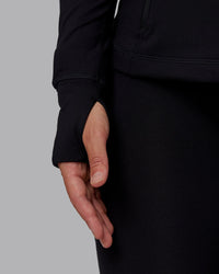 Woman wearing Stride Zip Through Jacket in Black | Size:S