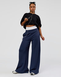Woman wearing 86 V-Neck Oversized Tee - Black-Black | Model:Sophia | Size:S |