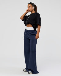 Woman wearing 86 V-Neck Oversized Tee - Black-Black | Model:Sophia | Size:S |