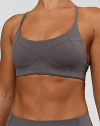 Woman wearing Infinite Contour Sports Bra - Duskstone | Model:Rosie | Size:S