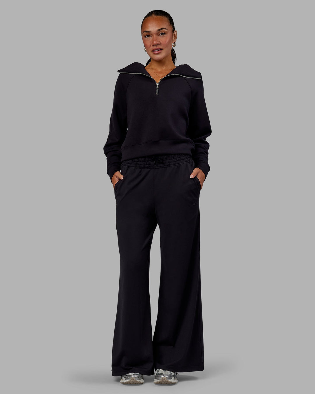 Woman wearing Restore CloudFLX Wide Leg Pants - Black