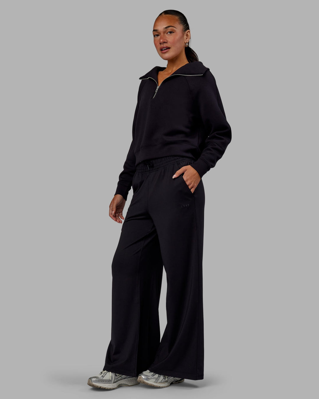 Woman wearing Restore CloudFLX Wide Leg Pants - Black