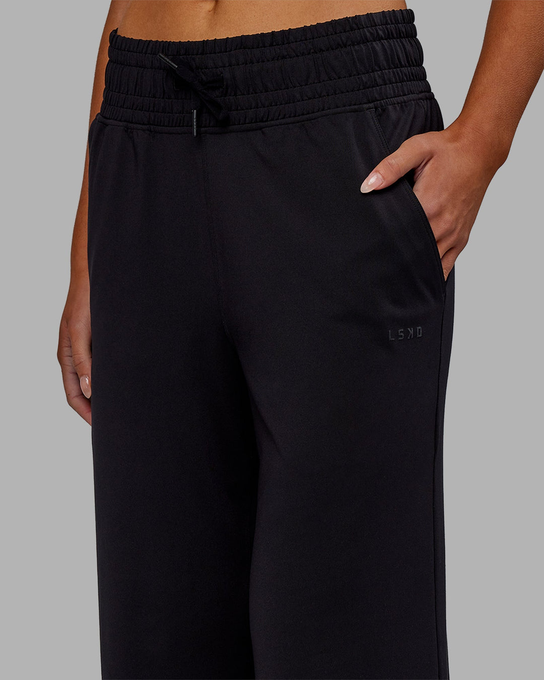 Woman wearing Restore CloudFLX Wide Leg Pants - Black