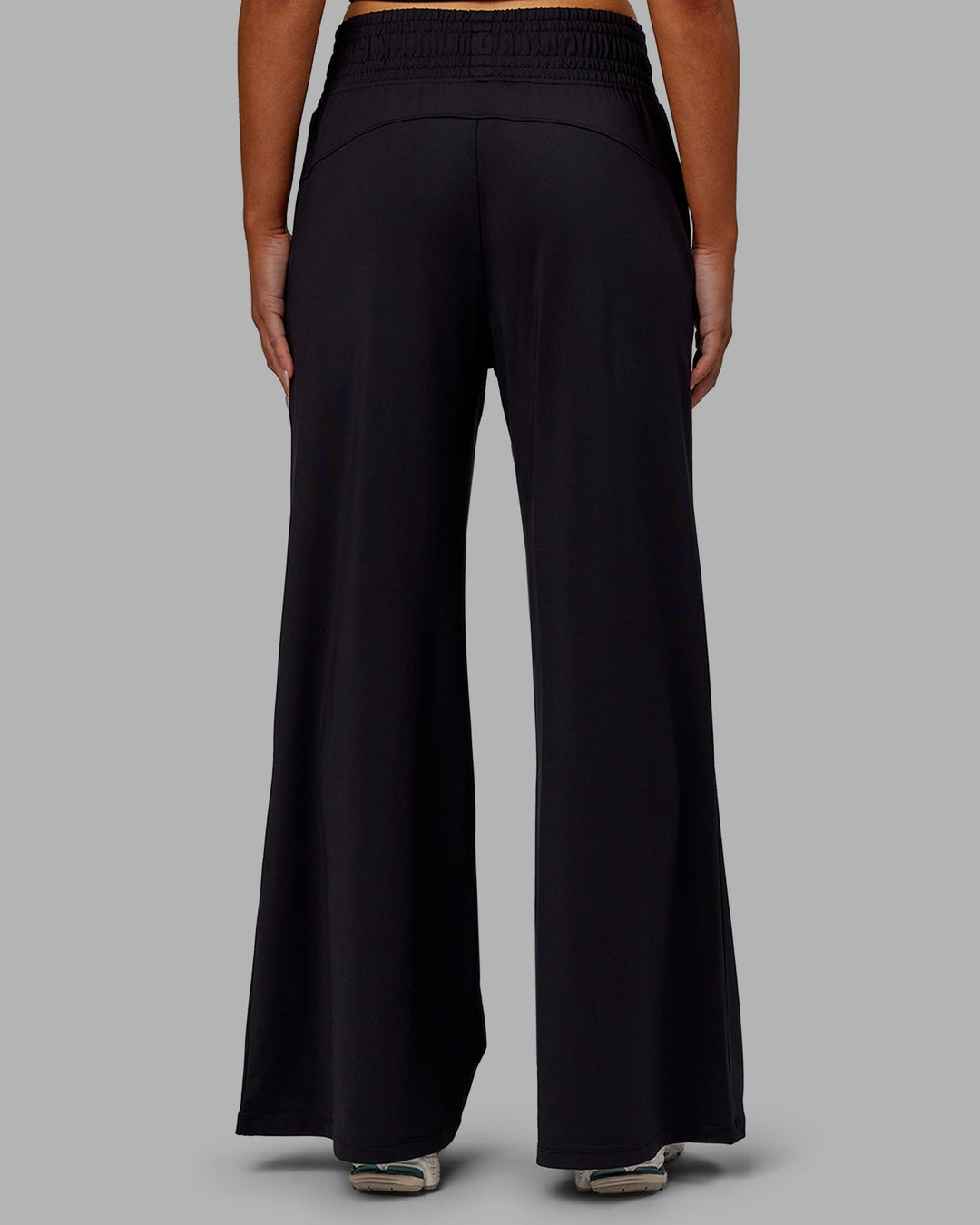 Woman wearing Restore CloudFLX Wide Leg Pants - Black