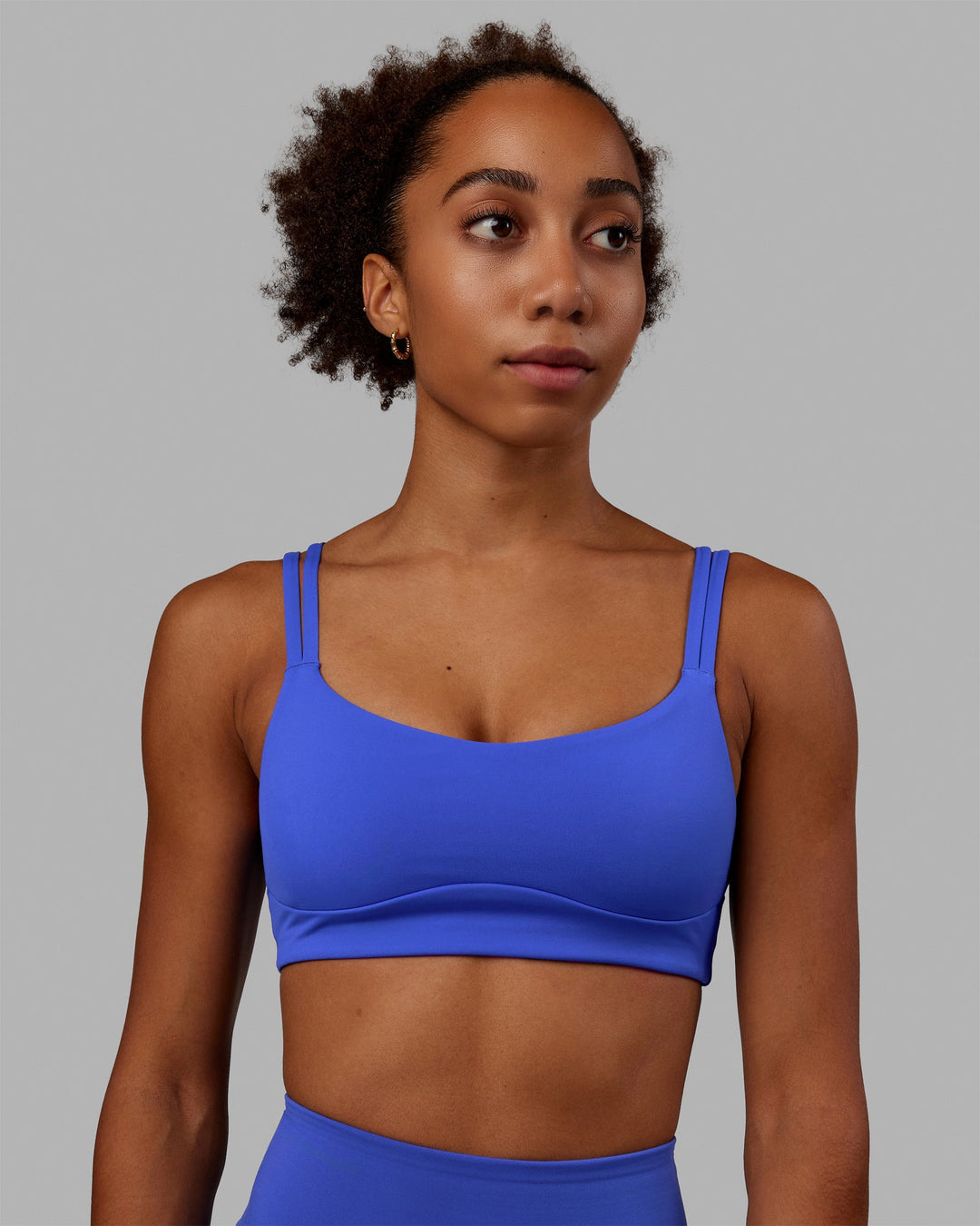 Woman wearing Vogue Sports Bra - Power Cobalt