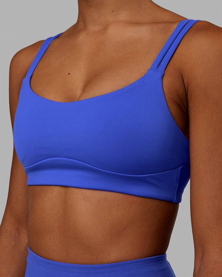 Woman wearing Vogue Sports Bra - Power Cobalt
