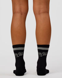 Woman wearing Run Club Fast Performance Socks 2.0 - Black-Reflective