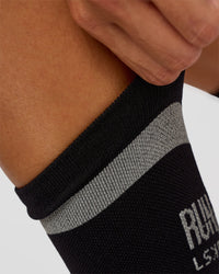 Woman wearing Run Club Fast Performance Socks 2.0 - Black-Reflective