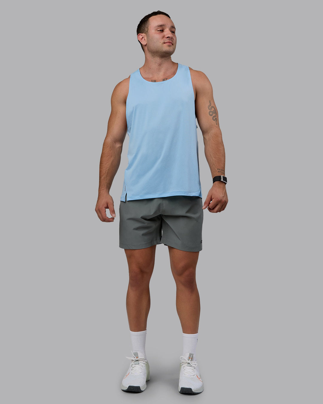 Man wearing Pace Running Tank - Glacial Blue