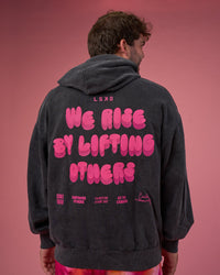 Man wearing BCAM Washed Unisex Oversized Hoodie - Black Washed-Pink | Model:Fletcher | Size:XL