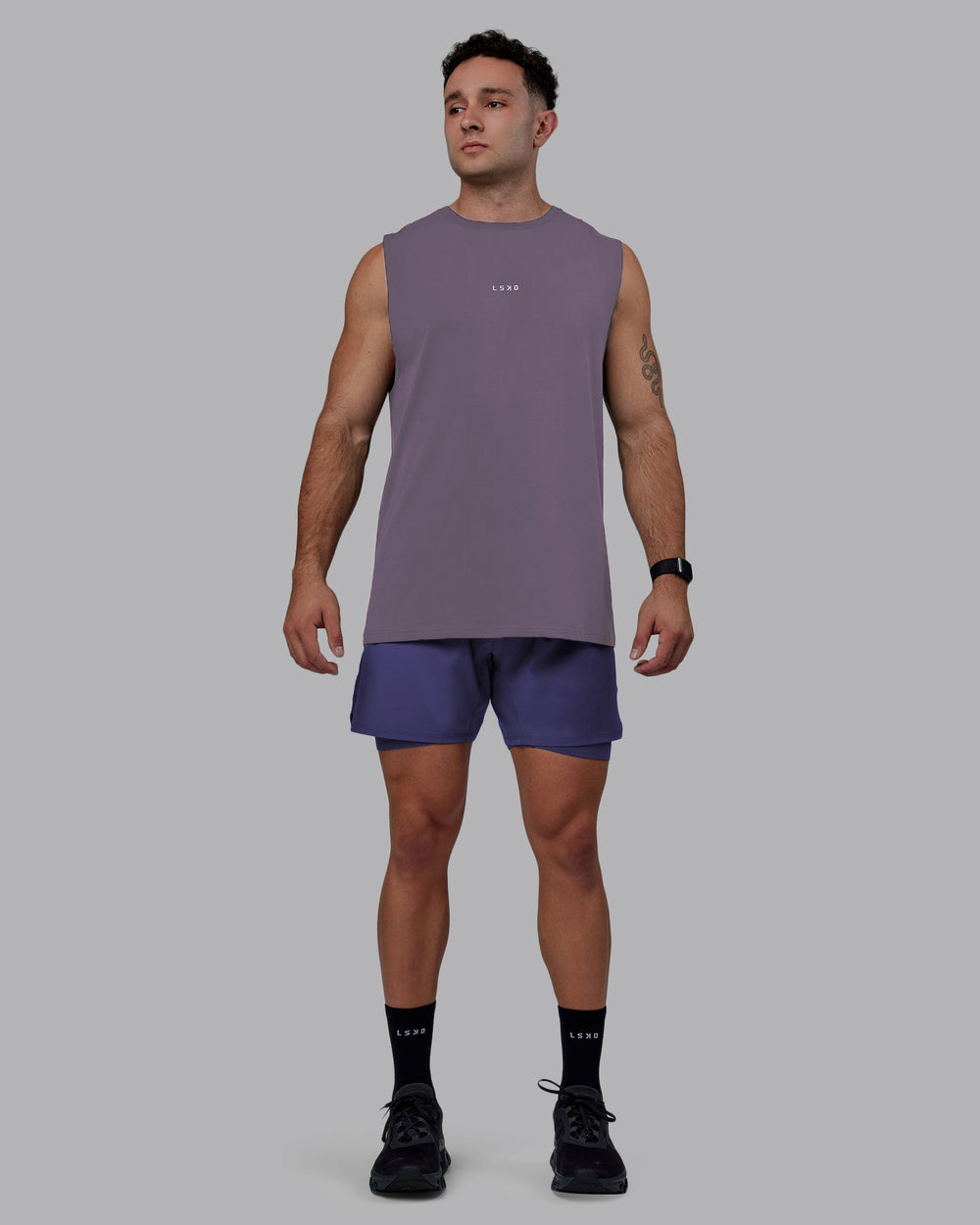 Man wearing Base FLXCotton Tank - Purple Sage