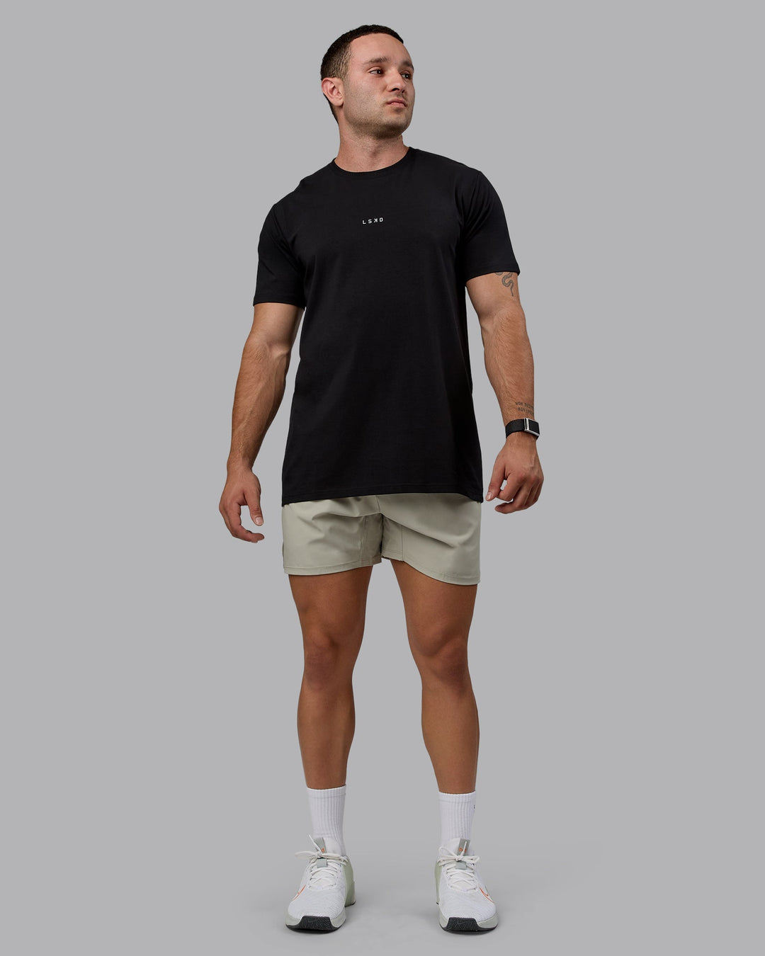 Man wearing Challenger 6&quot; Performance Shorts - Sustained Grey