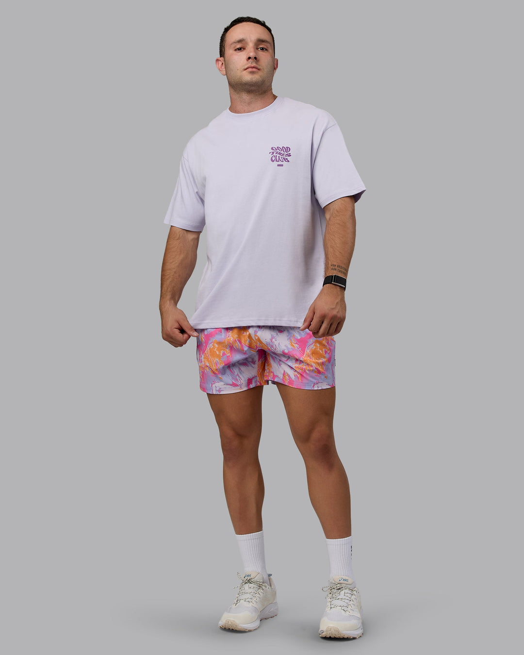 Man wearing Daily 5&quot; Swim Shorts - React Pink-Orange