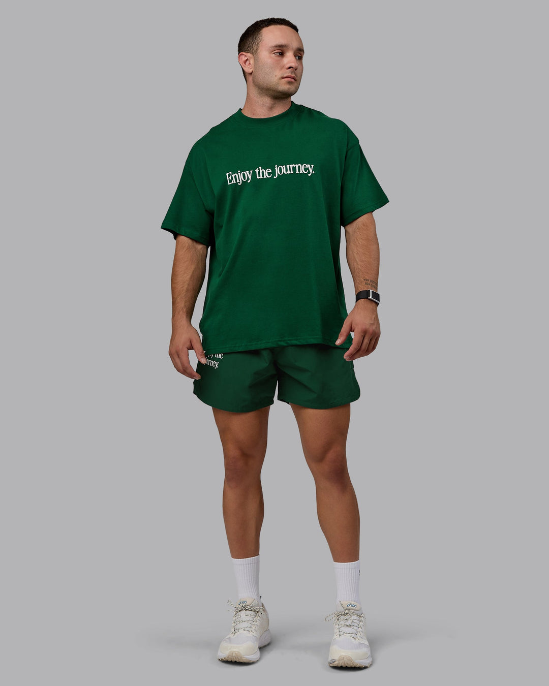 Man wearing Enjoy The Journey 5&quot; Shorts - Deep Emerald-Off White