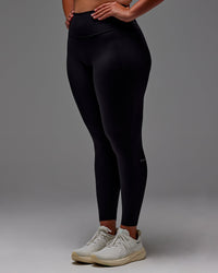 Woman wearing Fusion Ultra High-Rise Full Length Legging Pockets - Black | Model:Aimee | Size:XL