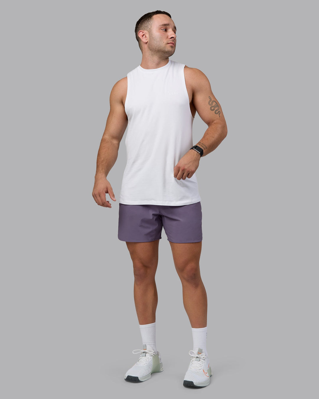 Man wearing Lift 6&quot; Performance Shorts - Purple Sage