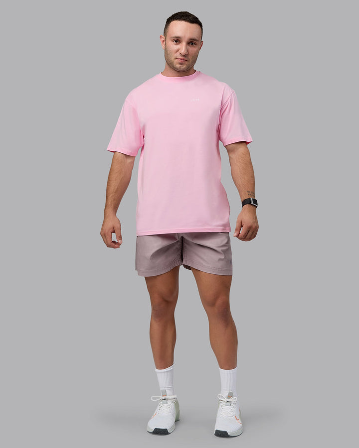 Man wearing Unisex 1% Better Value Series FLXCotton Tee Oversize - Pale Pink-White
